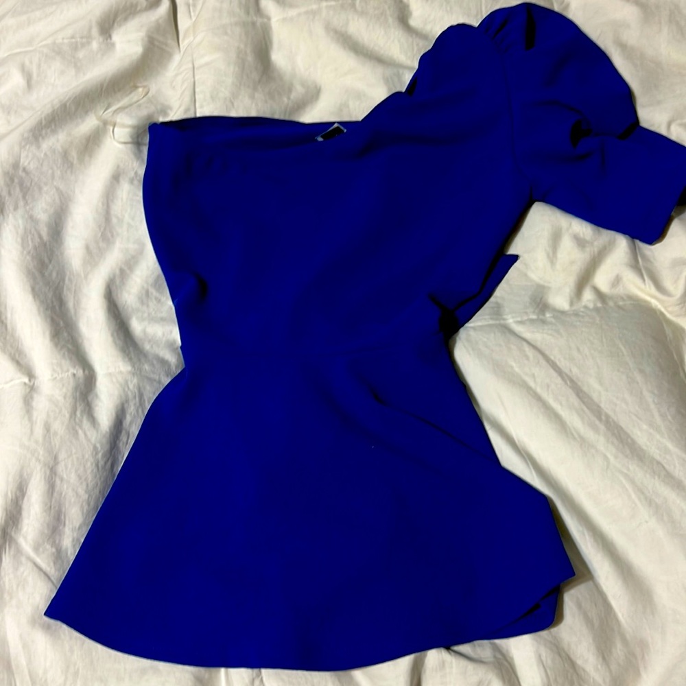 Woman’s small blue blouse